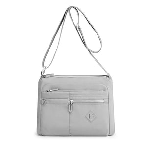 Leichte Schultertasche mit mehreren Taschen für Damen